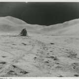 Views at the lunar-science station: David Scott at the Rover; human tracks; a photograph and other “souvenirs” left on the Moon; Hadley Base, July 26-August 7, 1971, EVA 3 - фото 7