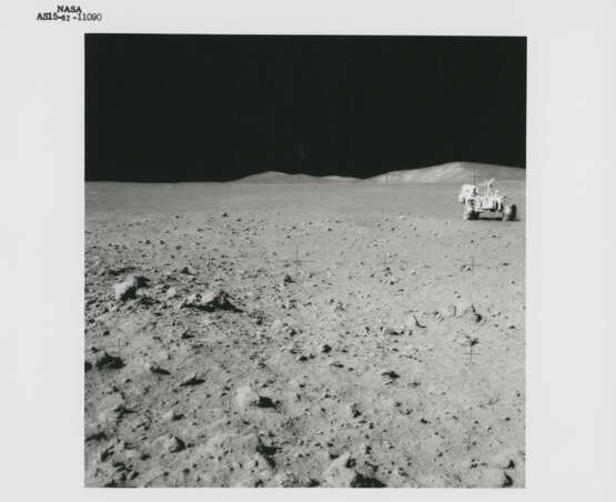 Views at station 9: James Irwin at the Rover; remarkable rock seen on the way; Fresh Crater; the Rover; geological investigations, July 26-August 7, 1971, EVA 3 - photo 1