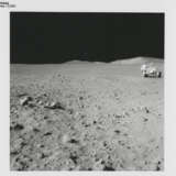 Views at station 9: James Irwin at the Rover; remarkable rock seen on the way; Fresh Crater; the Rover; geological investigations, July 26-August 7, 1971, EVA 3 - photo 1