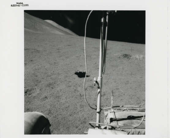 Views at station 9: James Irwin at the Rover; remarkable rock seen on the way; Fresh Crater; the Rover; geological investigations, July 26-August 7, 1971, EVA 3 - photo 3