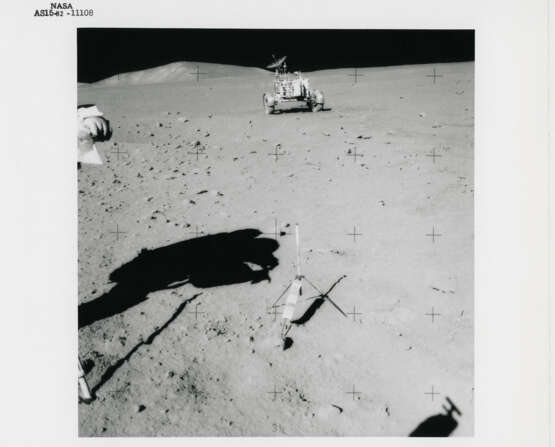 Views at station 9: James Irwin at the Rover; remarkable rock seen on the way; Fresh Crater; the Rover; geological investigations, July 26-August 7, 1971, EVA 3 - photo 7