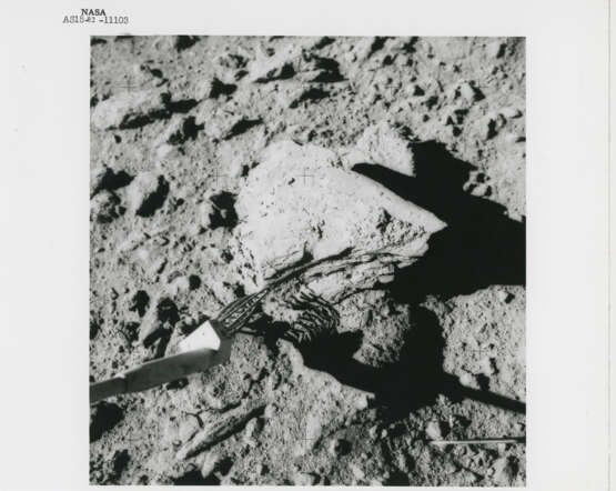 Views at station 9: James Irwin at the Rover; remarkable rock seen on the way; Fresh Crater; the Rover; geological investigations, July 26-August 7, 1971, EVA 3 - photo 10