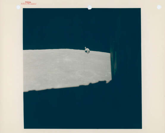 The LM Falcon returning from the Moon’s surface; moonscapes seen from the CM Endeavour; the CM approaching the LM for rendezvous, July 26-August 7, 1971 - photo 11
