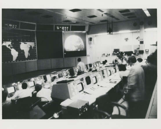Views of Earth during transposition and docking maneuvers; Mission Control monitoring the spacecraft, April 16-27, 1972 - photo 7