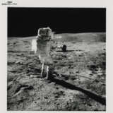 John Young taking photographs near the Rover; TV pictures; footprints; Young with the hammer; Plum Crater, station 1, April 16-27, 1972, EVA 1 - Foto 1