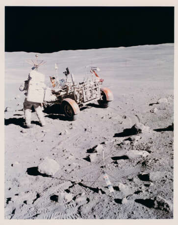 Charles Duke admiring the view; telephotograph of South Ray Crater; TV pictures; diptych of Duke on Stone Mountain; John Young and the Rover, station 4, April 16-27, 1972, EVA 2 - Foto 1