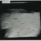 John Young taking photographs near the Rover; TV pictures; footprints; Young with the hammer; Plum Crater, station 1, April 16-27, 1972, EVA 1 - Foto 4