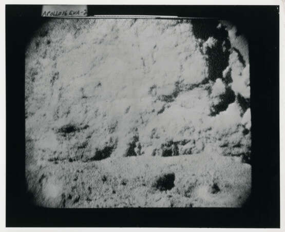 John Young pointing the Rover antenna toward Earth; TV pictures at Wreck Crater; Charles Duke hammering a double core tube, station 8, April 16-27, 1972, EVA 2 - фото 4