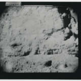 John Young pointing the Rover antenna toward Earth; TV pictures at Wreck Crater; Charles Duke hammering a double core tube, station 8, April 16-27, 1972, EVA 2 - photo 4