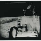 John Young taking photographs near the Rover; TV pictures; footprints; Young with the hammer; Plum Crater, station 1, April 16-27, 1972, EVA 1 - photo 6