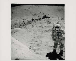 John Young with House Rock in the background; close-ups documenting geological investigations, station 11, April 16-27, 1972, EVA 3