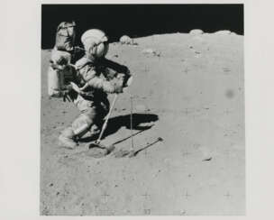 John Young collecting samples; TV pictures; House Rock; views of Charles Duke inspecting Outhouse Rock, station 11, April 16-27, 1972, EVA 3