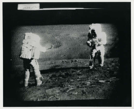 John Young taking photographs near the Rover; TV pictures; footprints; Young with the hammer; Plum Crater, station 1, April 16-27, 1972, EVA 1 - Foto 15