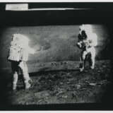 John Young taking photographs near the Rover; TV pictures; footprints; Young with the hammer; Plum Crater, station 1, April 16-27, 1972, EVA 1 - Foto 15