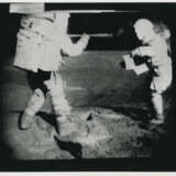 John Young taking photographs near the Rover; TV pictures; footprints; Young with the hammer; Plum Crater, station 1, April 16-27, 1972, EVA 1 - photo 17
