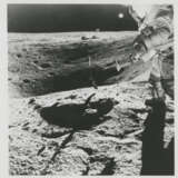 John Young taking photographs near the Rover; TV pictures; footprints; Young with the hammer; Plum Crater, station 1, April 16-27, 1972, EVA 1 - photo 23