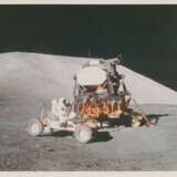 Eugene Cernan on the Rover by the LM; the first photograph after touchdown; lunarscape; Cernan testing the Rover, December 7-19, 1972, pre EVA 1, EVA 1 - Foto 1