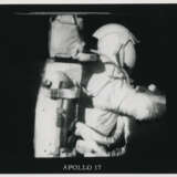 Harrison Schmitt holding the rake; TV pictures; the rim of Steno Crater; footprints; the rising Sun illuminating the Rover, station 1, December 7-19, 1972, EVA 1 - фото 3