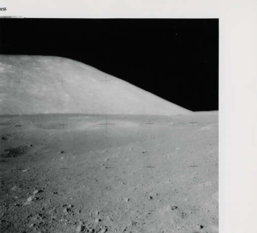 Orange soil near Shorty Crater; lunarscape towards the South Massif; blurred photograph; Harrison Schmitt near the Rover, station 4, December 7-19, 1972, EVA 2 - photo 3