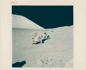 The Rover parked on the slope of the North Massif; Tracy’s Rock; TV pictures; Eugene Cernan examining Tracy’s Rock, station 6, December 7-19, 1972, EVA 3