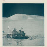 Harrison Schmitt near the Rover; lunarscape; shadow and boulder; diptych of boulder; Schmitt taking samples; summit of the North Massif, station 7, December 7-19, 1972, EVA 3 - фото 1