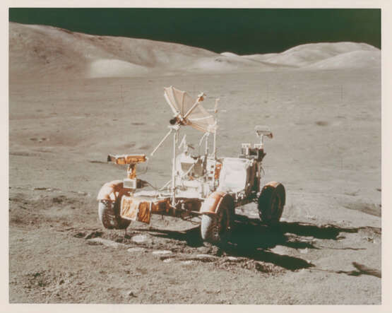 The Lunar Rover; lunarscapes during sunny traverse from station 7; the exotic boulder and geological investigations; Rover tracks, station 8, December 7-19, 1972, EVA 3 - photo 1