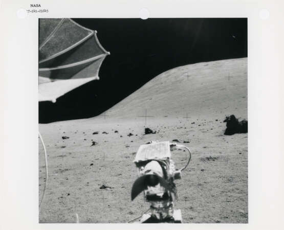 Harrison Schmitt near the Rover; lunarscape; shadow and boulder; diptych of boulder; Schmitt taking samples; summit of the North Massif, station 7, December 7-19, 1972, EVA 3 - photo 3