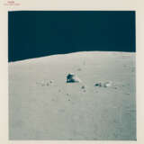 Harrison Schmitt near the Rover; lunarscape; shadow and boulder; diptych of boulder; Schmitt taking samples; summit of the North Massif, station 7, December 7-19, 1972, EVA 3 - photo 14