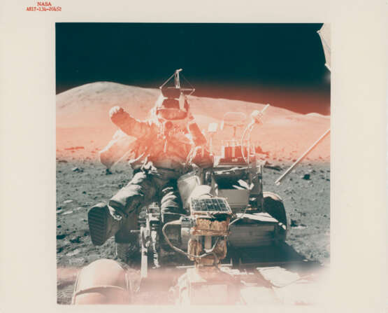 Eugene Cernan next to the Rover; sunstruck photograph of Harrison Schmitt jumping into the LMP seat of the Rover, station 9, December 7-19, 1972, EVA 3 - photo 3
