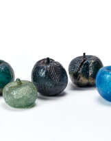 Four oranges and a mandarin