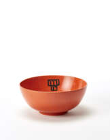 Bowl in orange glazed ceramic