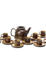 Service part consisting of nine cups, ten saucers and a teapot
