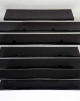 Lot of seven shelves in black lacquered wood of different lengths