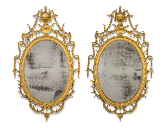 Linnell, John. A PAIR OF GEORGE III GILTWOOD AND CARTON PIERRE OVAL MIRRORS... - photo 1