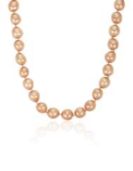 CHANEL LONG PINK FAUX PEARL NECKLACE