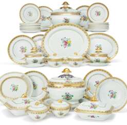 A LARGE FAMILLE ROSE AND GILT DINNER SERVICE