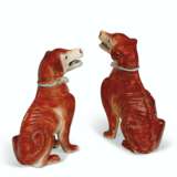 A PAIR OF IRON-RED HOUNDS - photo 1