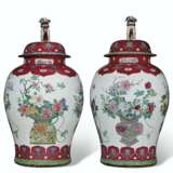 A MASSIVE PAIR OF RUBY AND FAMILLE ROSE JARS AND COVERS - photo 1