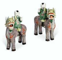 A LARGE AND RARE PAIR OF FAMILLE VERTE BOYS RIDING QILIN