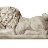 A CARVED WHITE MARBLE RECUMBENT LION - photo 1