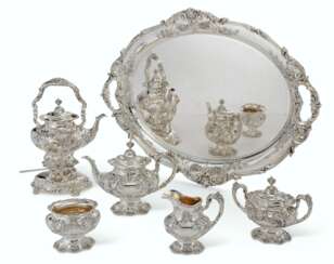 AN AMERICAN SILVER FIVE-PIECE TEA SERVICE AND TWO-HANDLED TR...