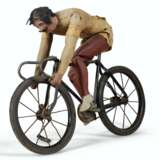 AN ARTICULATED PAINTED PINE AND FABRIC CYCLIST - Foto 1