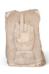 A CARVED MARBLE FRAGMENT DEPICTING A POINTING HAND