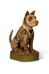 A CARVED AND PAINTED WOOD DOG