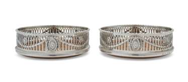 A PAIR OF GEORGE III SILVER WINE COASTERS
