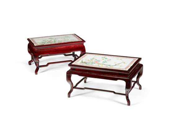 A PAIR OF CHINESE FAMILLE ROSE PLAQUES, NOW MOUNTED IN WOOD STANDS - photo 1