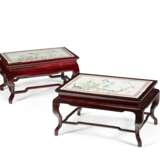 A PAIR OF CHINESE FAMILLE ROSE PLAQUES, NOW MOUNTED IN WOOD STANDS - фото 1
