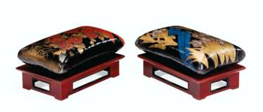 A PAIR OF JAPANESE LACQUER PILLOWS AND LOW STANDS