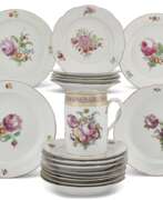 Porzellanmanufaktur Gardner. TWENTY-TWO RUSSIAN PORCELAIN PLATES AND A TANKARD FROM THE EVERYDAY SERVICE