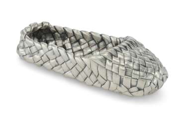 A RUSSIAN SILVER TROMPE L'OEIL DISH IN THE FORM OF A BAST SHOE